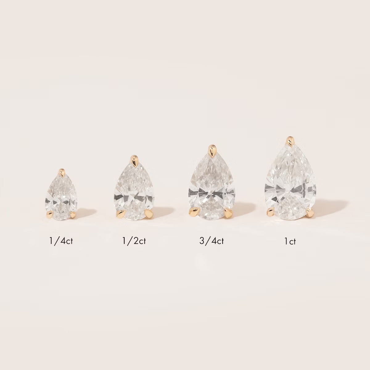 Solitaire- 0.50 CT Pear Moissanite Stud Earrings