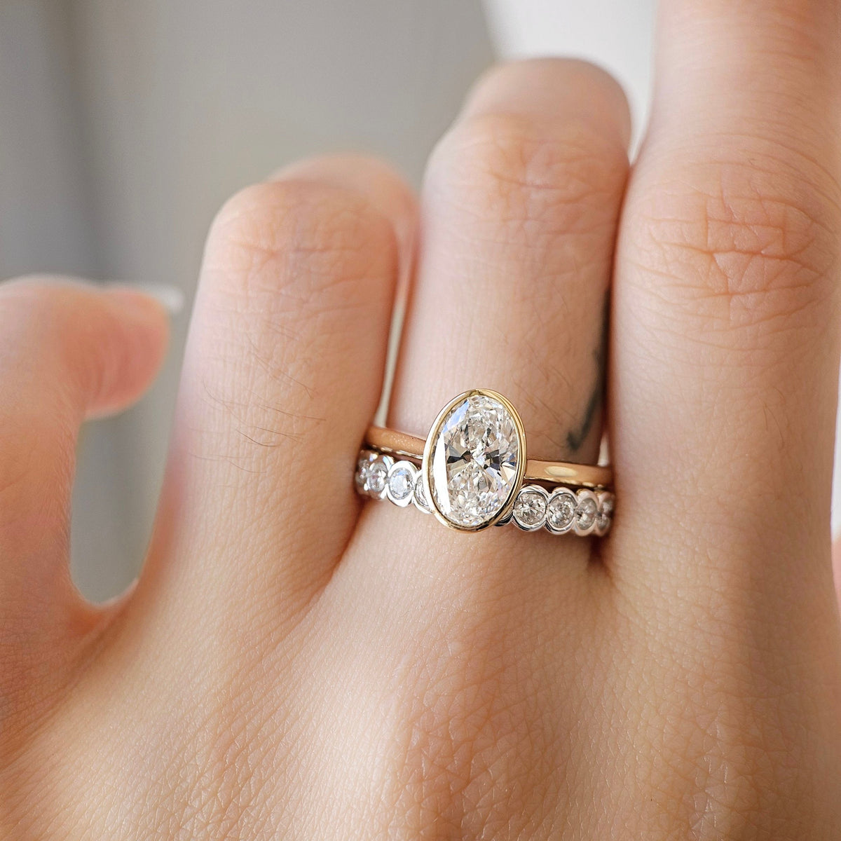 Solitaire Bezel-2.0 CT Oval Lab Grown Diamond Engagement Ring