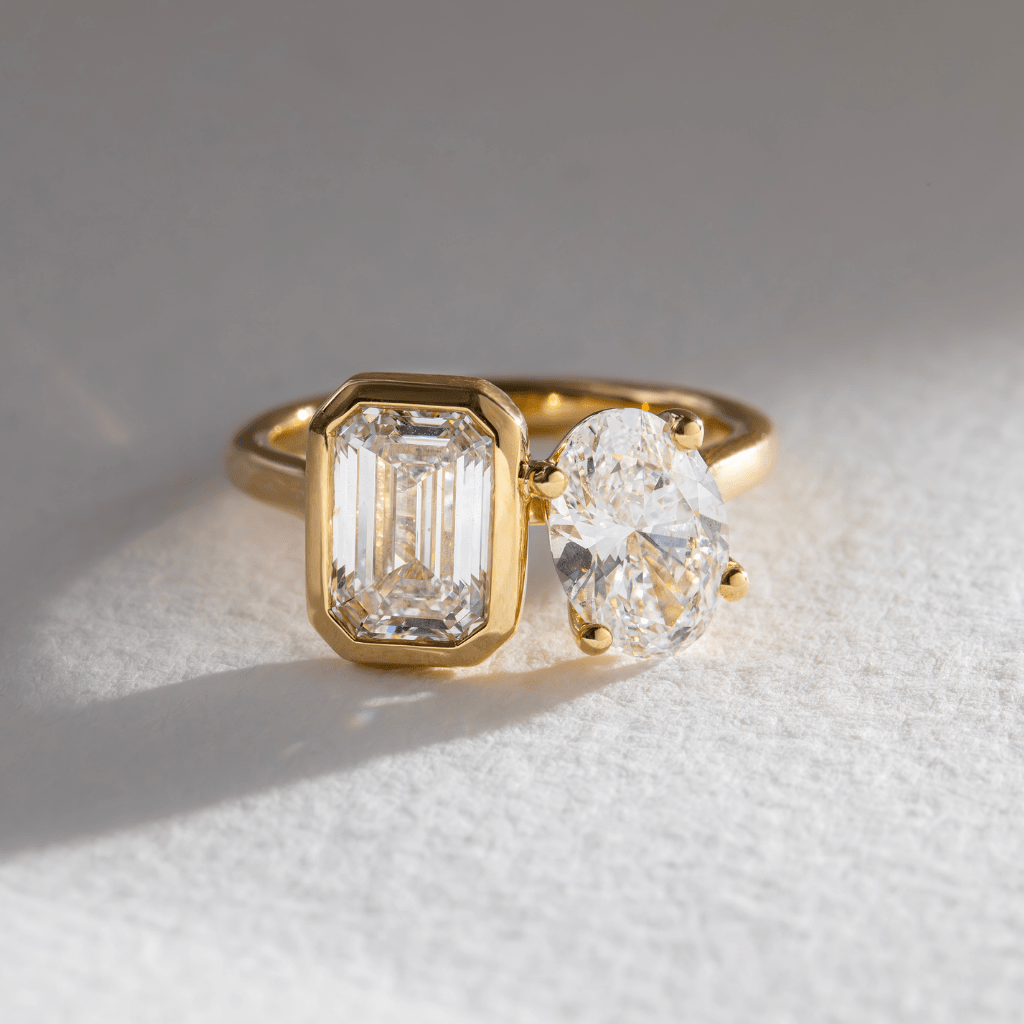 Toi Et Moi & Bezel-Emerald & Oval Lab Grown Diamond Engagement Ring