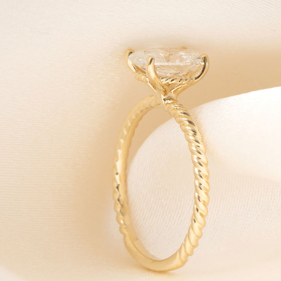 Solitaire & Twisted Shank-1.5 CT Oval Lab Grown Diamond Engagement Ring