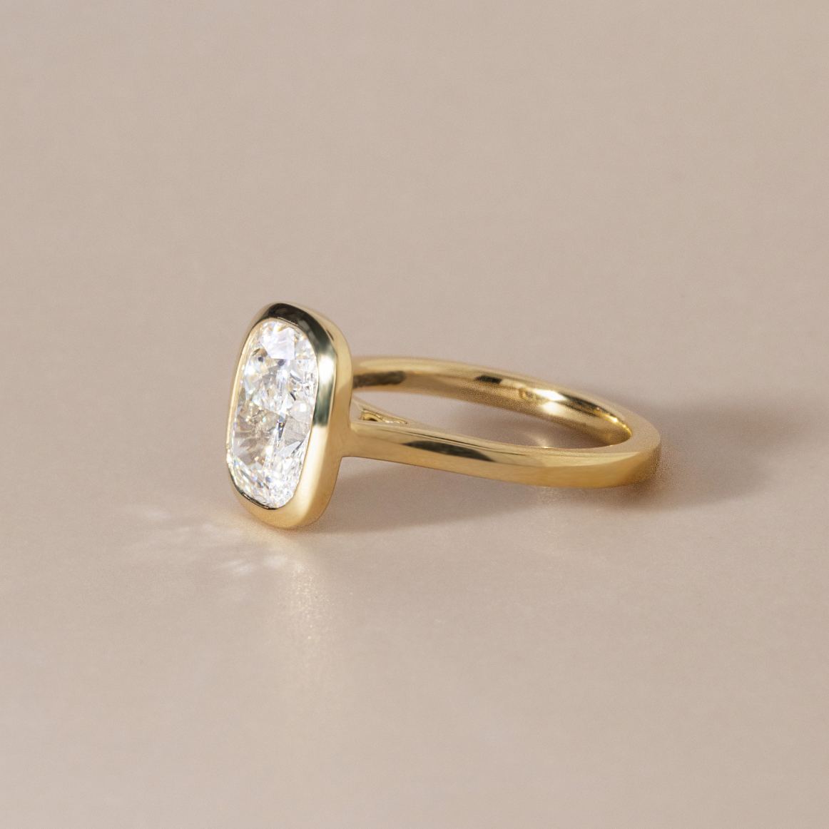 Solitaire Bezel-Elongated Cushion Lab Grown Diamond Engagement Ring