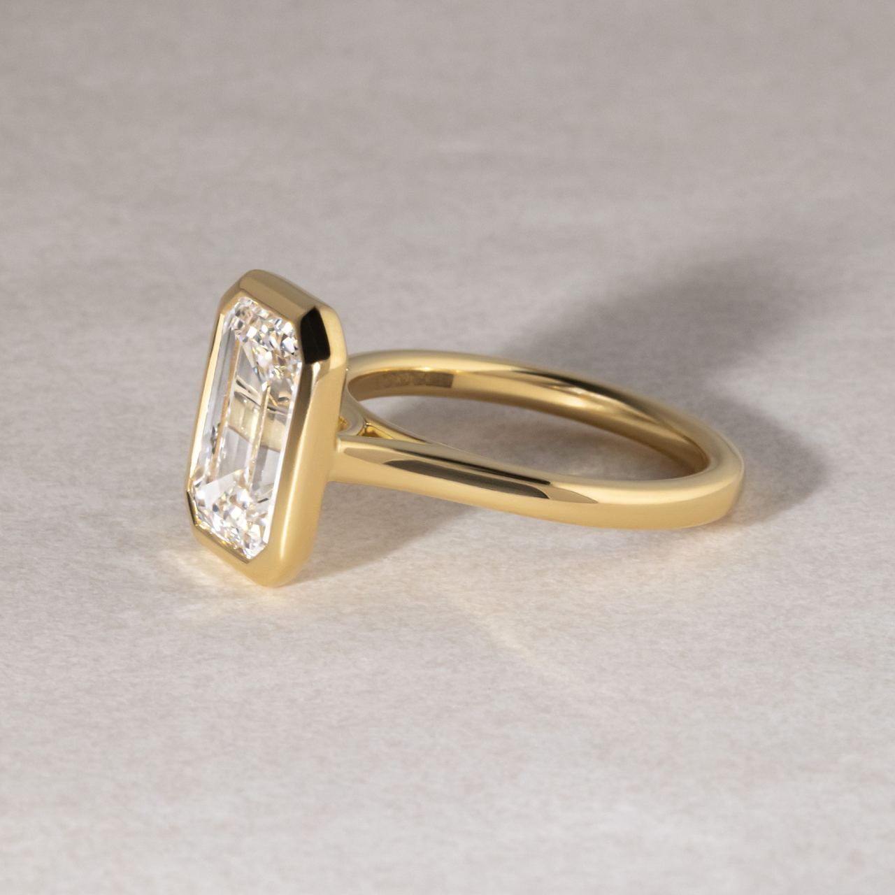 Solitaire Bezel-Emerald Lab Grown Diamond Engagement Ring