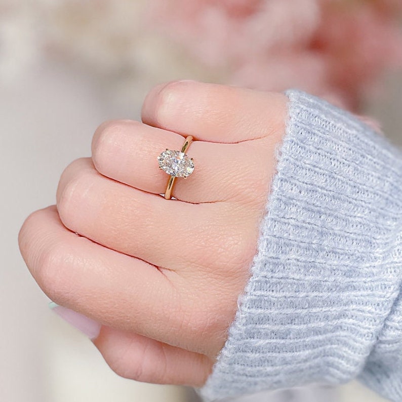 Elegant 2.28 CT Oval Lab-Grown Diamond Solitaire Engagement Ring 9