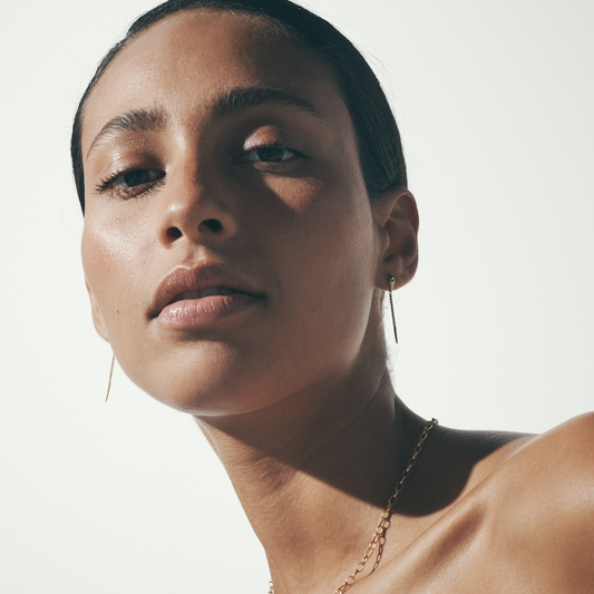 Golden Chain Drop Earrings with Emerald Accents 2