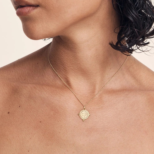 Timeless Elegance: Gold Circle Pendant Necklace 2
