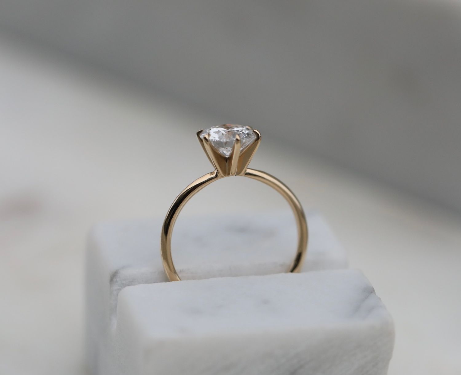 1.5 CT Round Lab-Grown Diamond Solitaire Engagement Ring in Elegant Gold Setting