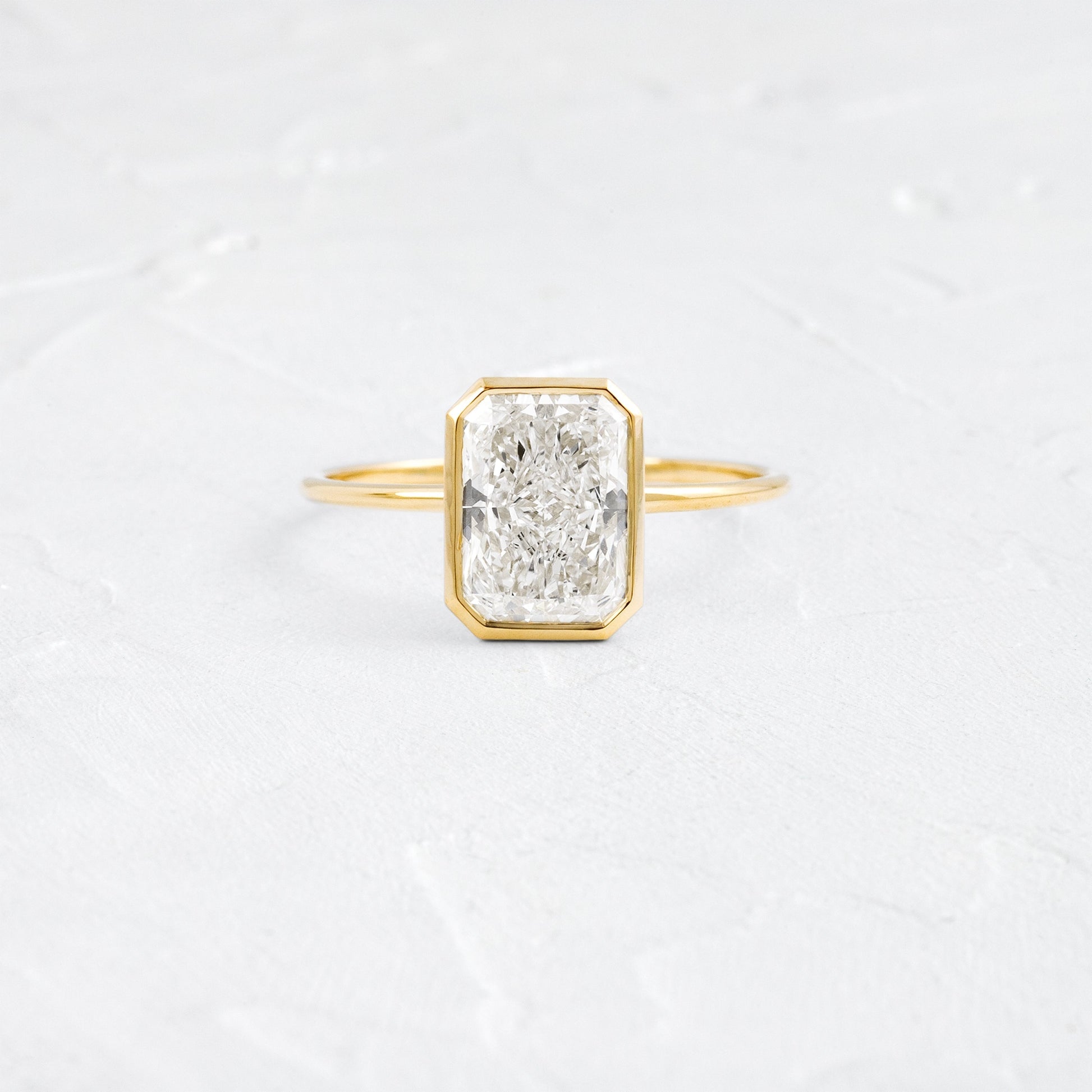 Solitaire Bezel with Hidden Stone-Radiant Lab Grown Diamond Engagement Ring