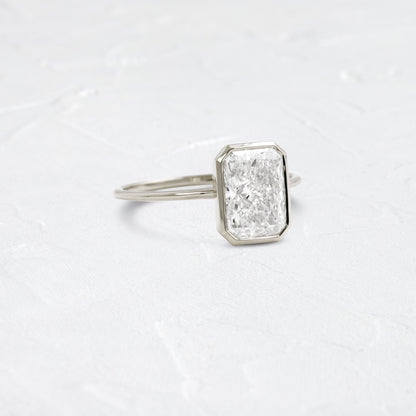 Solitaire Bezel with Hidden Stone-Radiant Lab Grown Diamond Engagement Ring