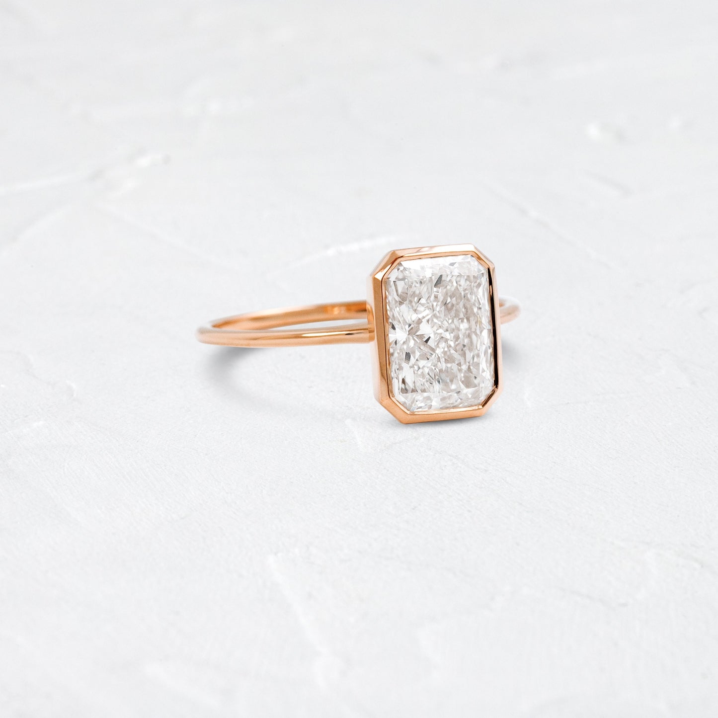 Solitaire Bezel with Hidden Stone-Radiant Lab Grown Diamond Engagement Ring