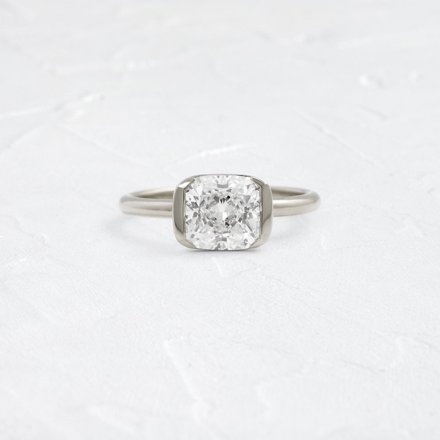 Half Bezel & East West-Elongated Cushion Lab Grown Diamond Engagement Ring