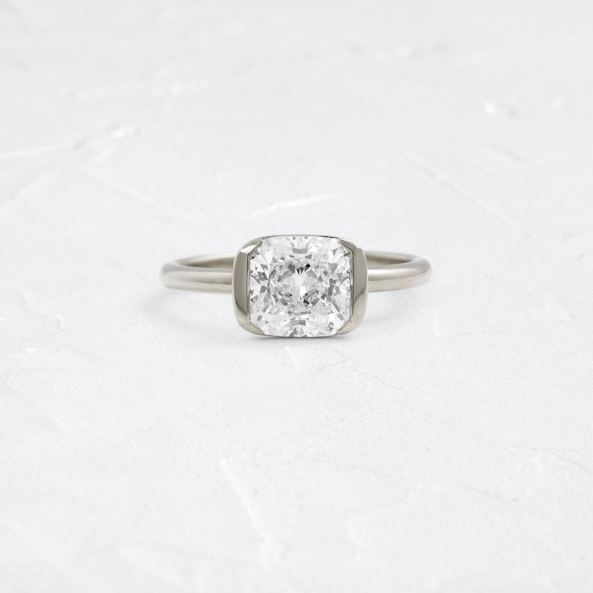 Half Bezel & East West-Elongated Cushion Lab Grown Diamond Engagement Ring