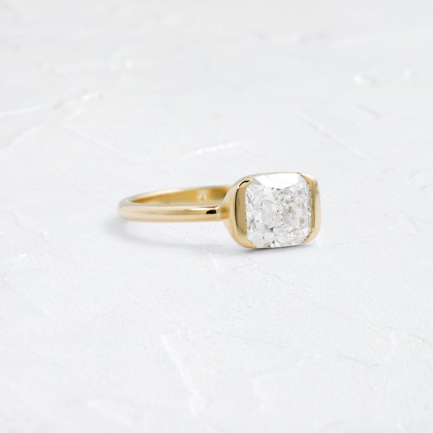 Half Bezel & East West-Elongated Cushion Lab Grown Diamond Engagement Ring