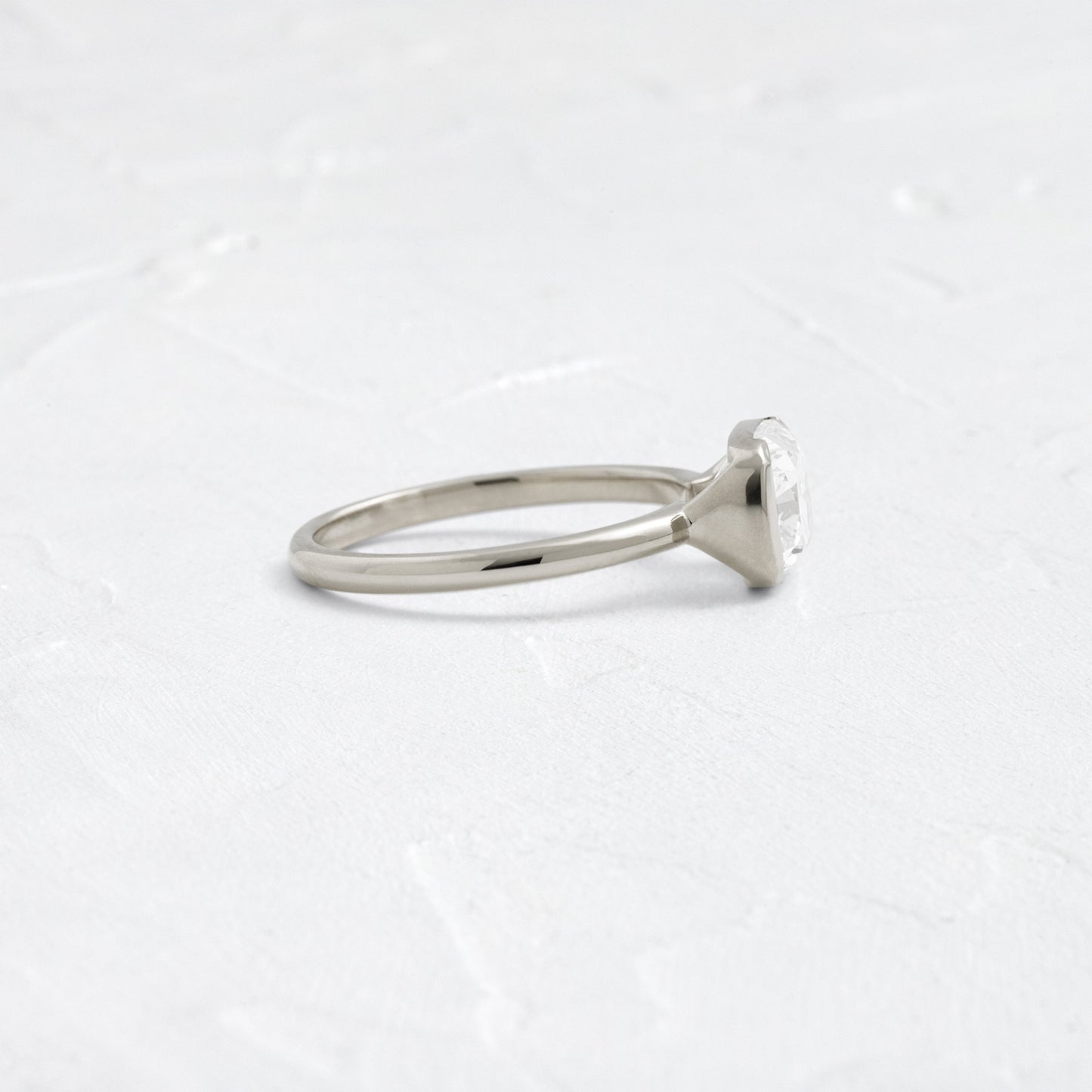 Half Bezel & East West-Elongated Cushion Lab Grown Diamond Engagement Ring
