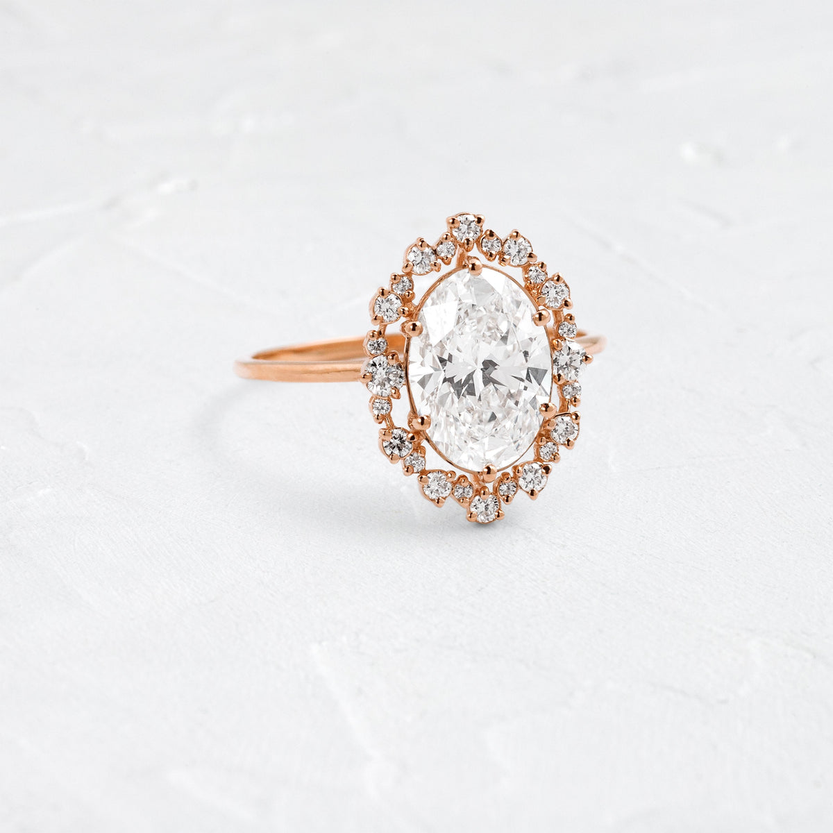 Graduated Halo-Oval Lab Grown Diamond Engagement Ring