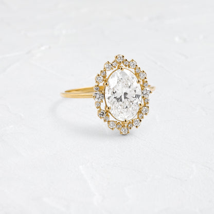 Graduated Halo-Oval Lab Grown Diamond Engagement Ring