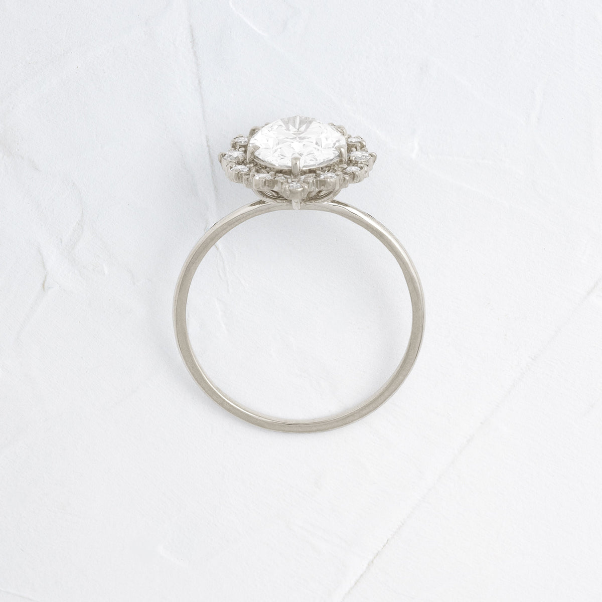 Graduated Halo-Oval Lab Grown Diamond Engagement Ring