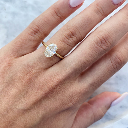 1.5 CT Oval Lab-Grown Diamond Solitaire Engagement Ring in Elegant Gold Setting