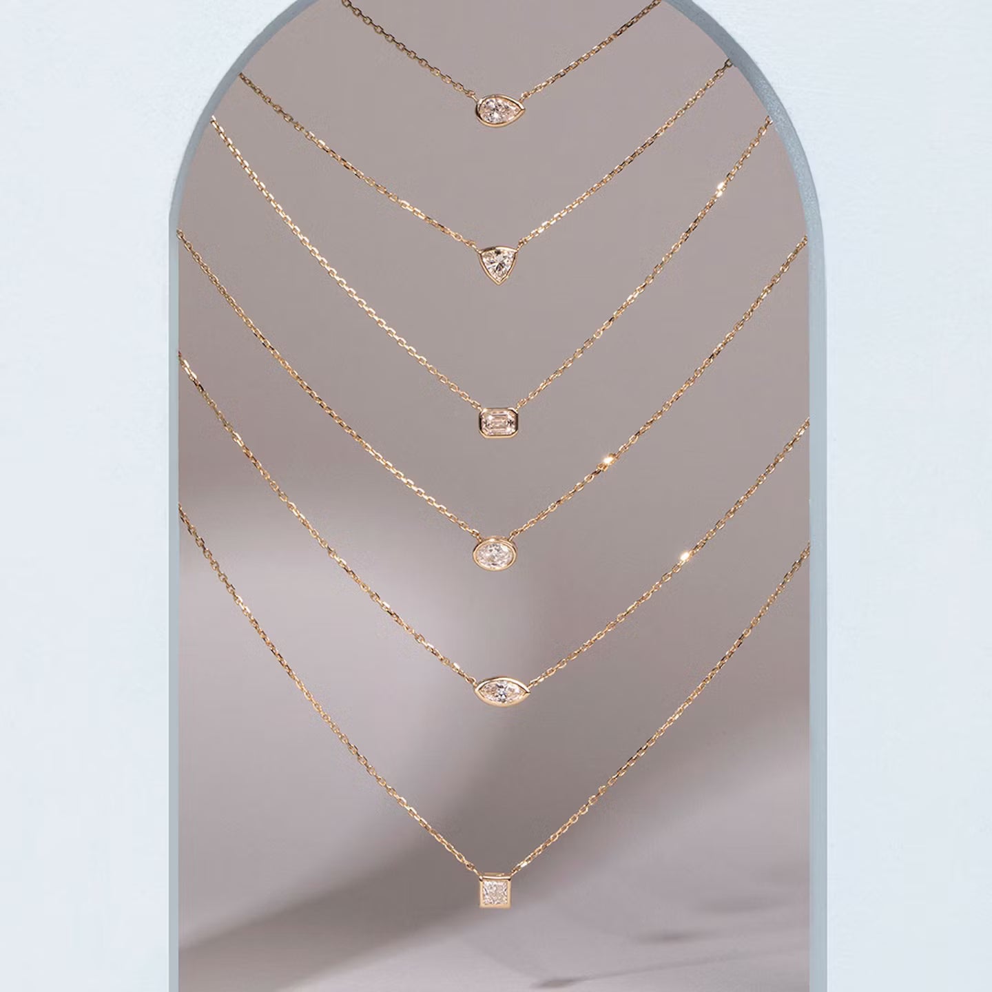East West Solitaire Bezel- 0.25 CT Pear Moissanite Necklace
