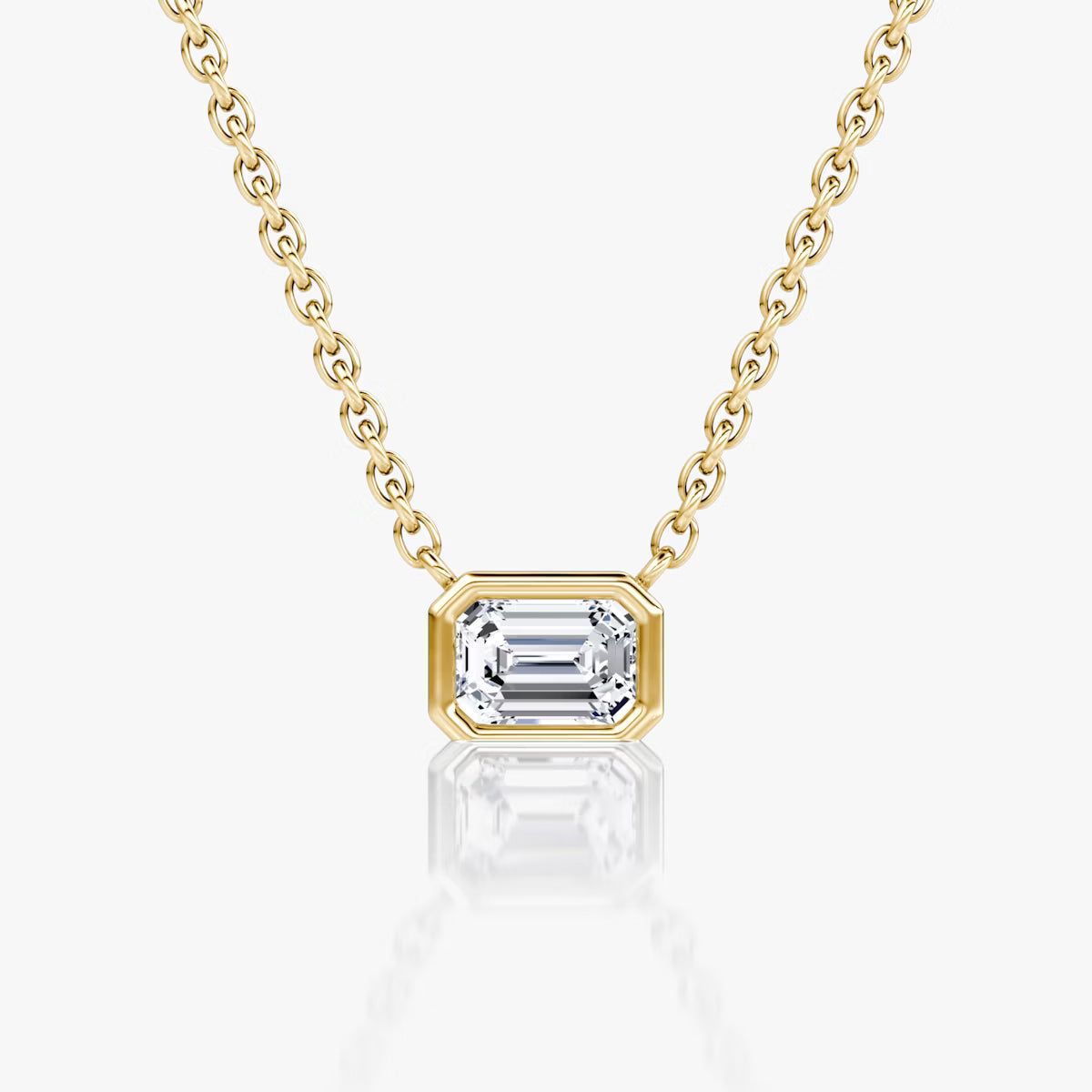 East West Solitaire Bezel- 0.25 CT Emerald Moissanite Necklace