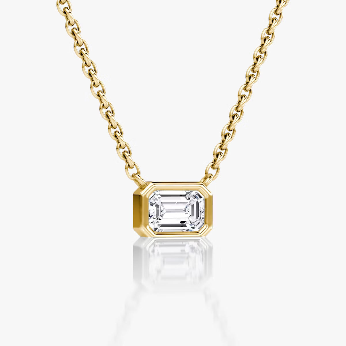 East West Solitaire Bezel- 0.25 CT Emerald Moissanite Necklace