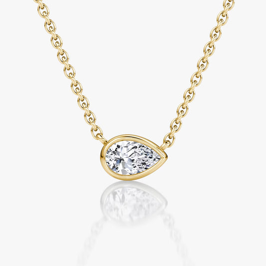 East West Solitaire Bezel- 0.25 CT Pear Moissanite Necklace