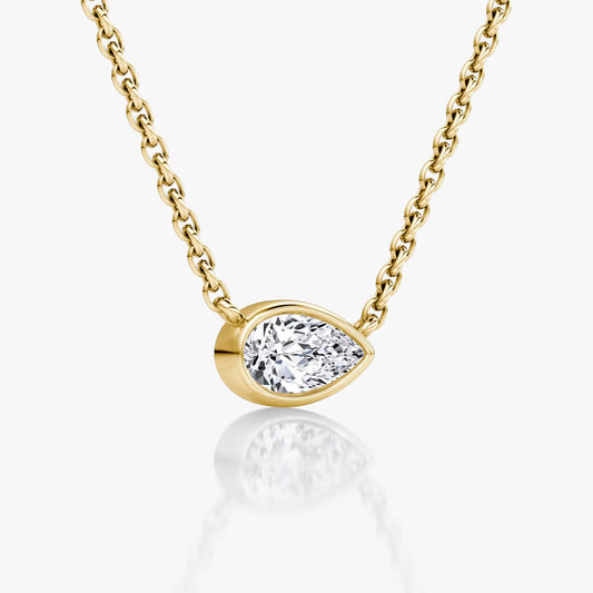 East West Solitaire Bezel- 0.25 CT Pear Moissanite Necklace