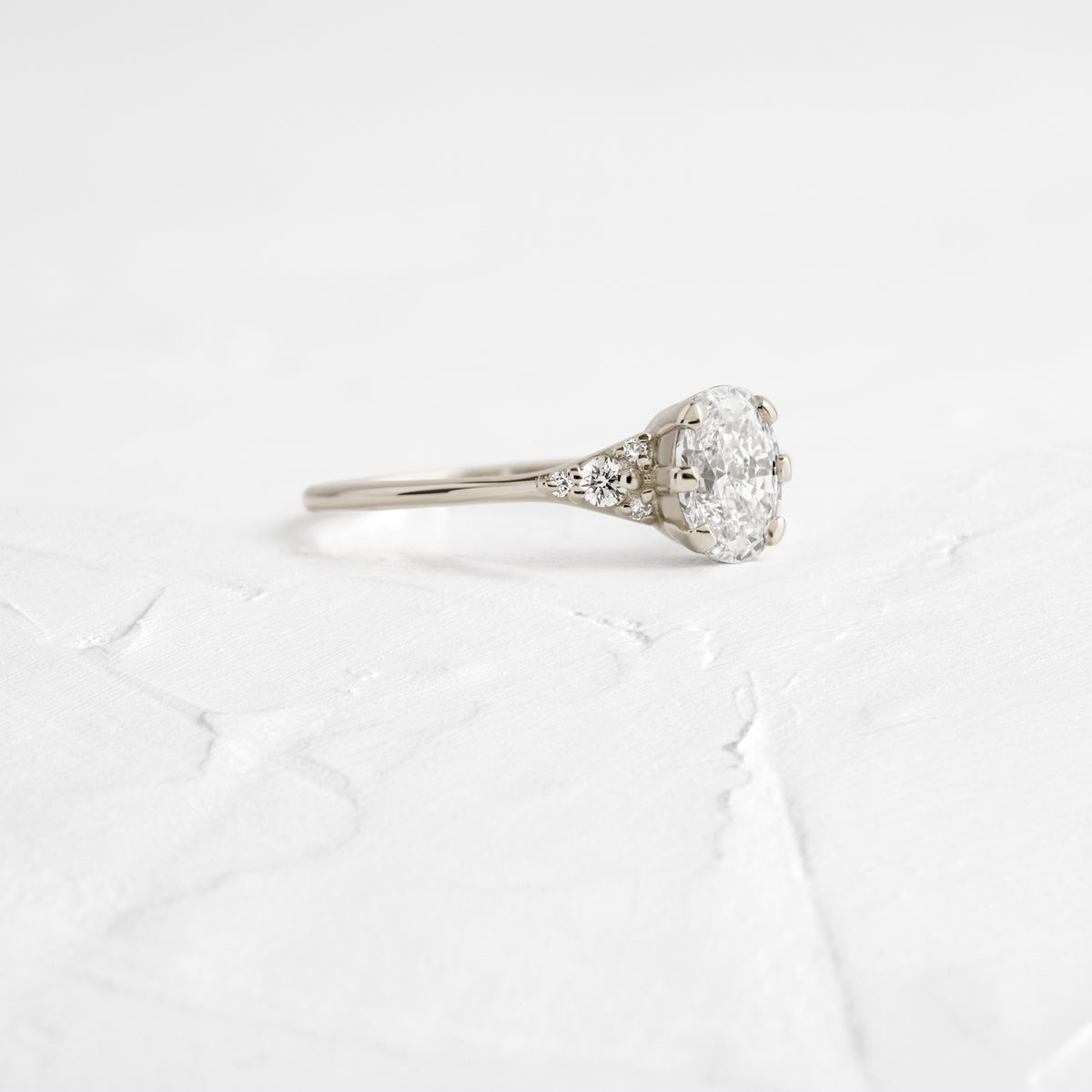 Cluster & Six Square Prong-Oval Lab Grown Diamond Engagement Ring