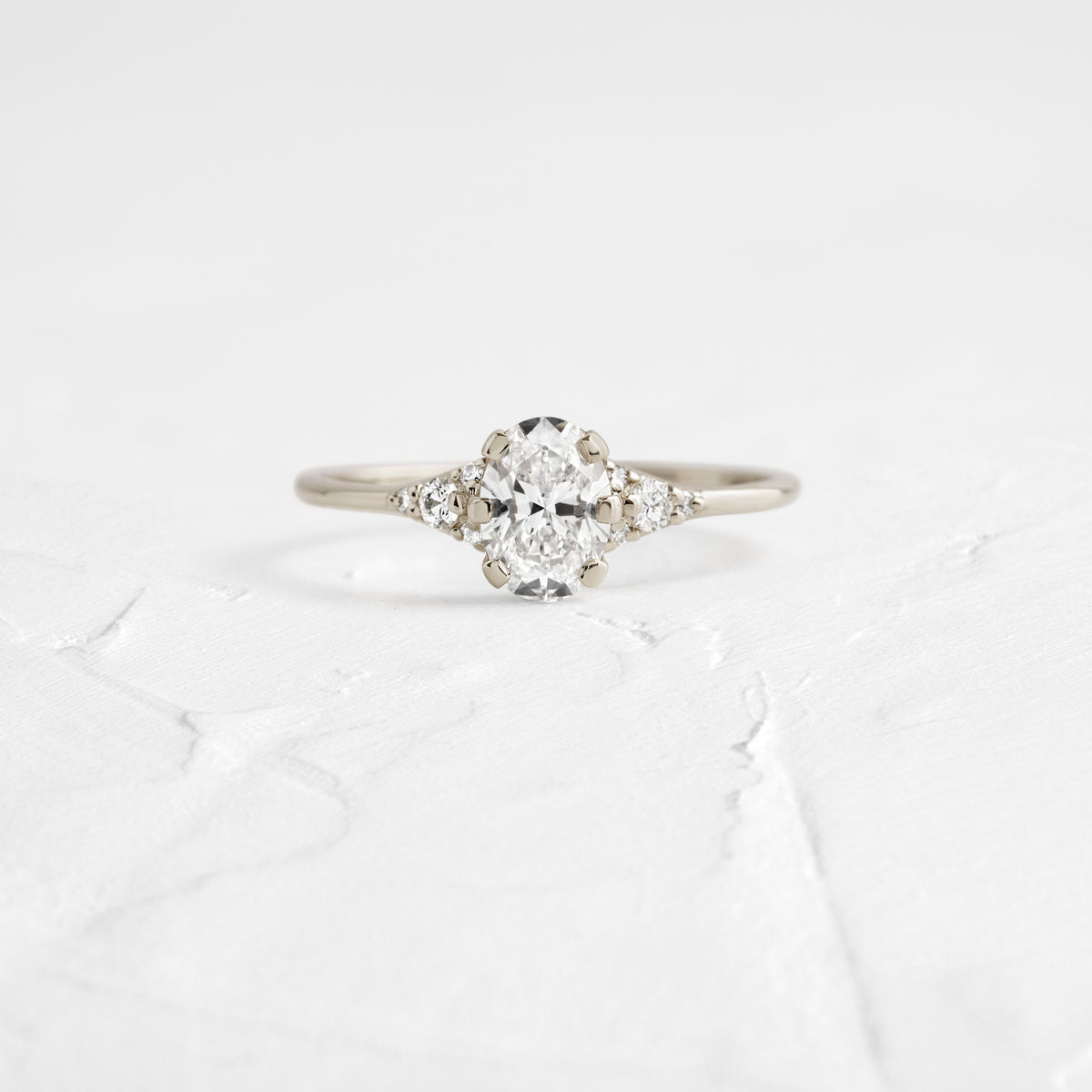 Cluster & Six Square Prong-Oval Lab Grown Diamond Engagement Ring