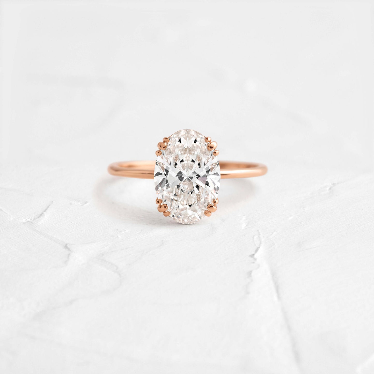 Solitaire Triple Prong with Hidden Stones-Oval Lab Grown Diamond Engagement Ring