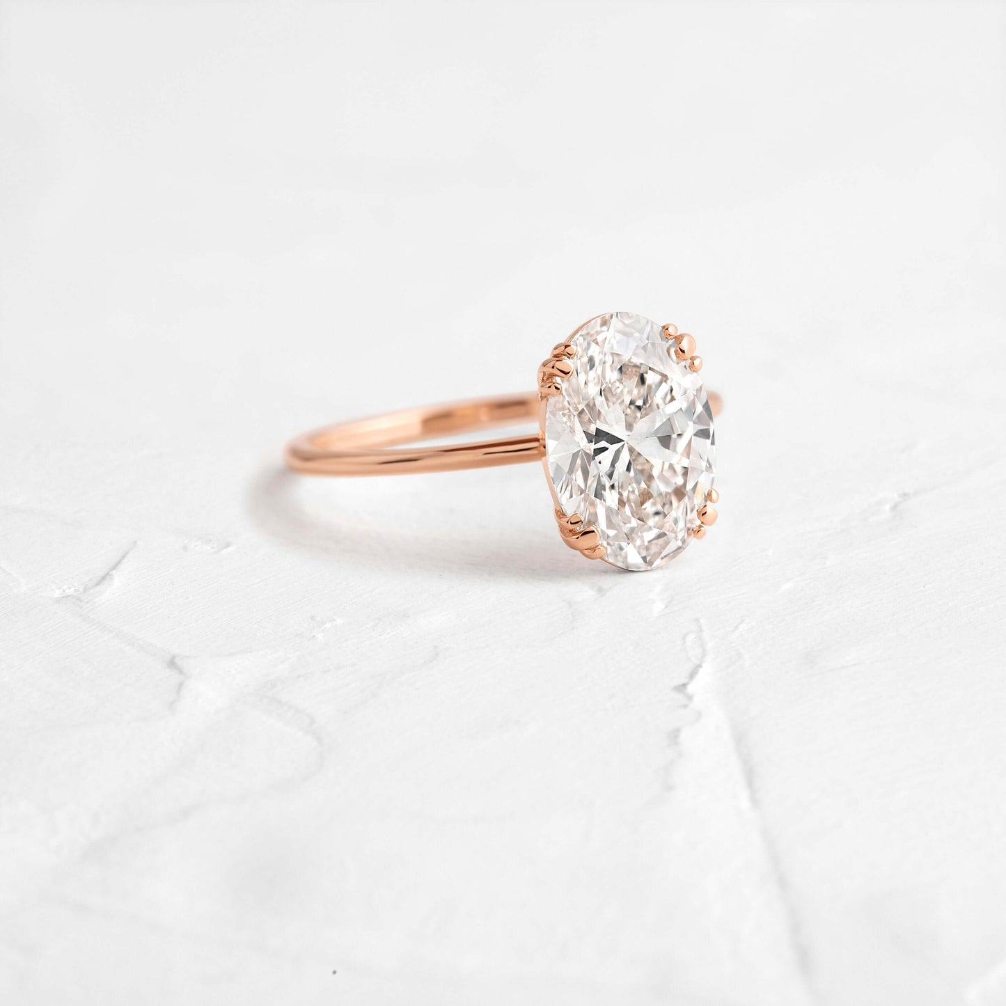 Solitaire Triple Prong with Hidden Stones-Oval Lab Grown Diamond Engagement Ring