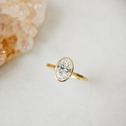 Solitaire Bezel-2.0 CT Oval Lab Grown Diamond Engagement Ring