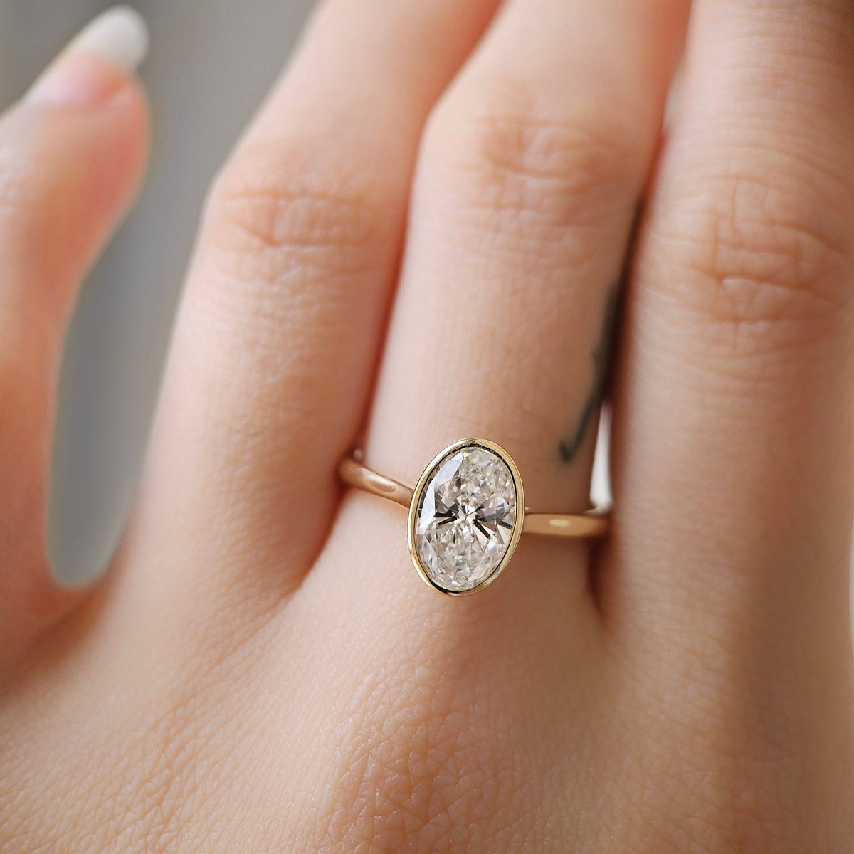 Solitaire Bezel-2.0 CT Oval Lab Grown Diamond Engagement Ring