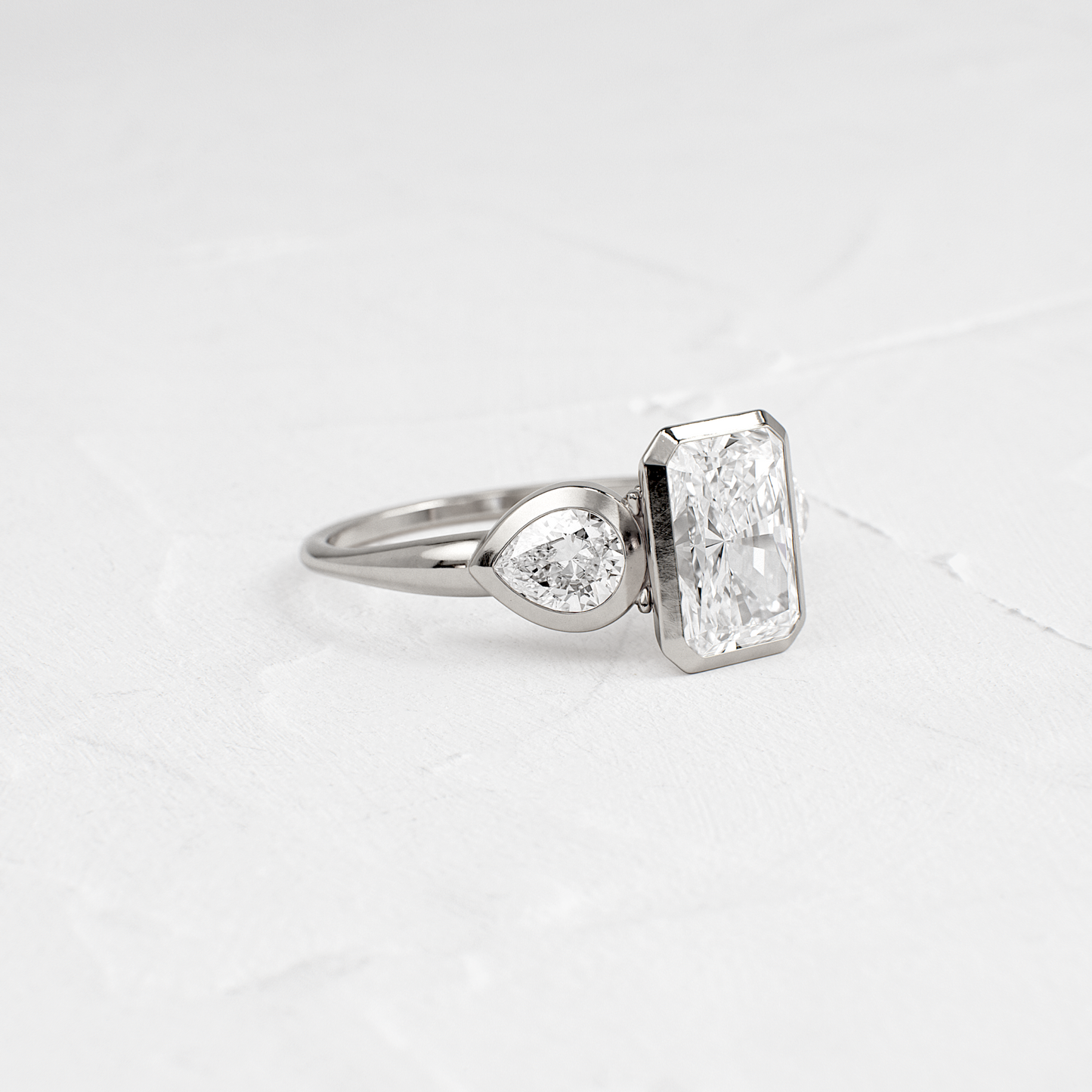 Three Stone & Bezel-Radiant Lab Grown Diamond Engagement Ring