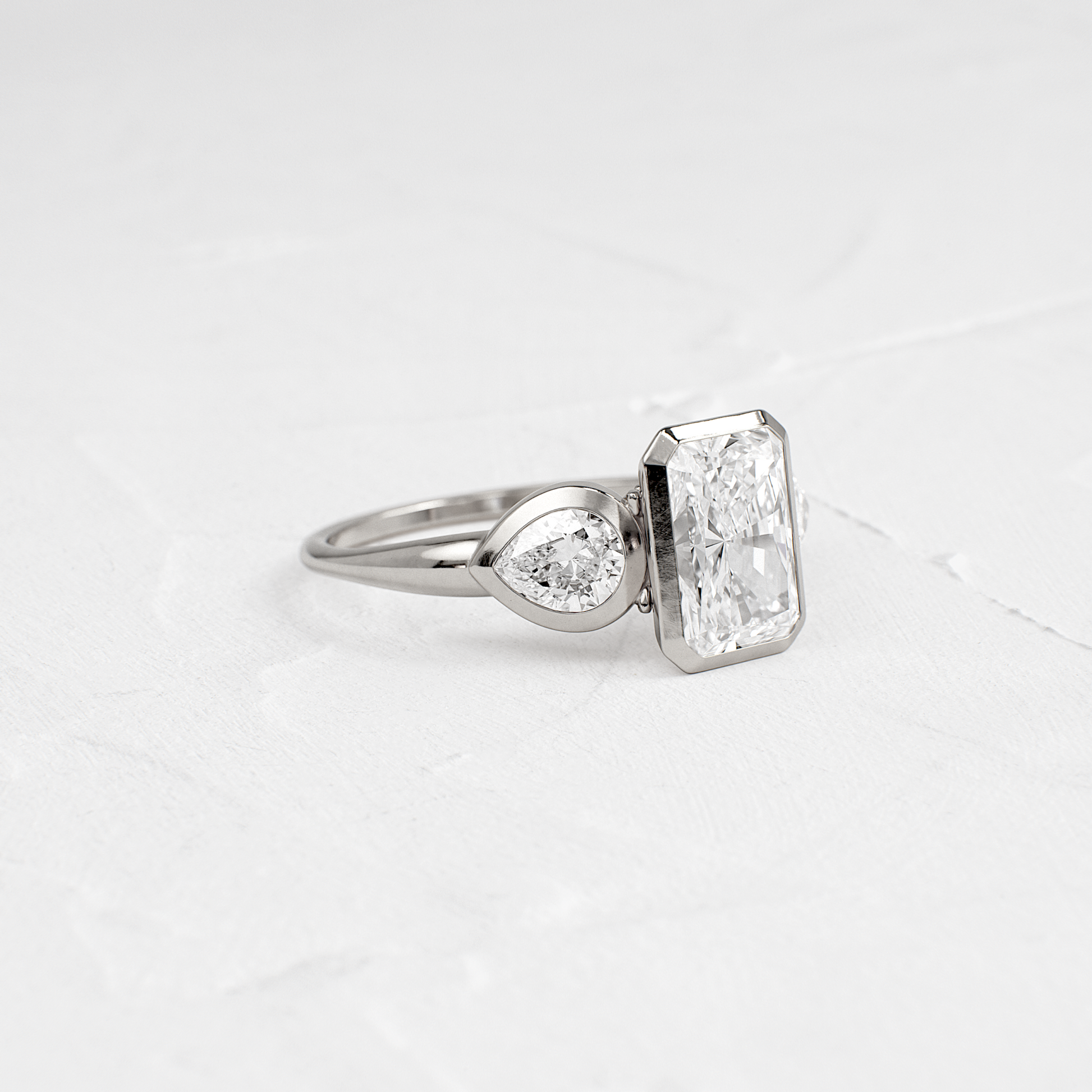Three Stone & Bezel-Radiant Lab Grown Diamond Engagement Ring