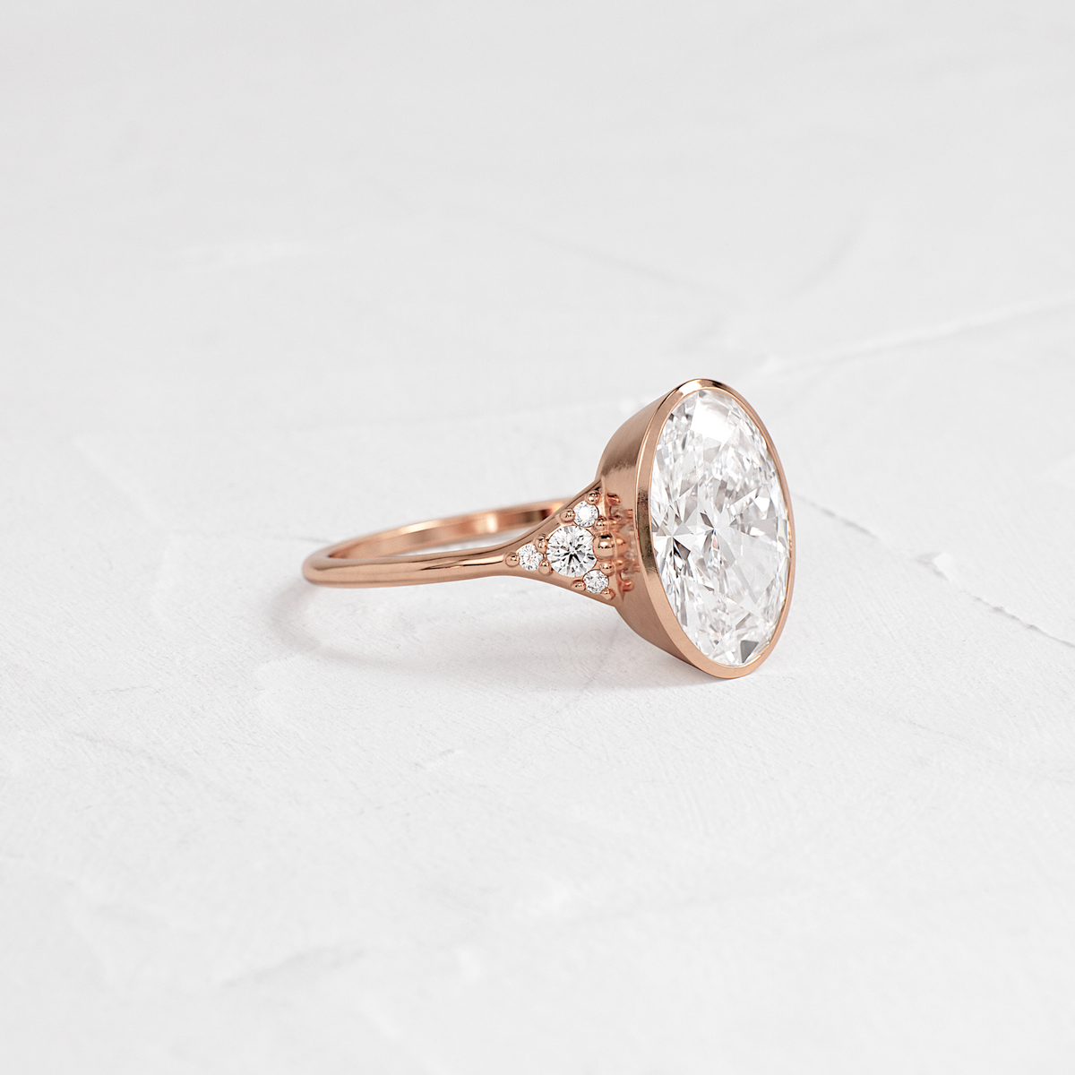 Bezel & Cluster Style-Oval Lab Grown Diamond Engagement Ring