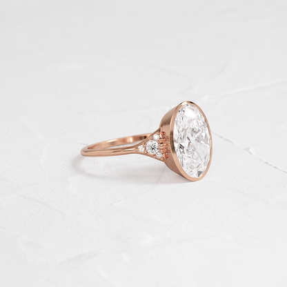 Bezel & Cluster Style-Oval Lab Grown Diamond Engagement Ring