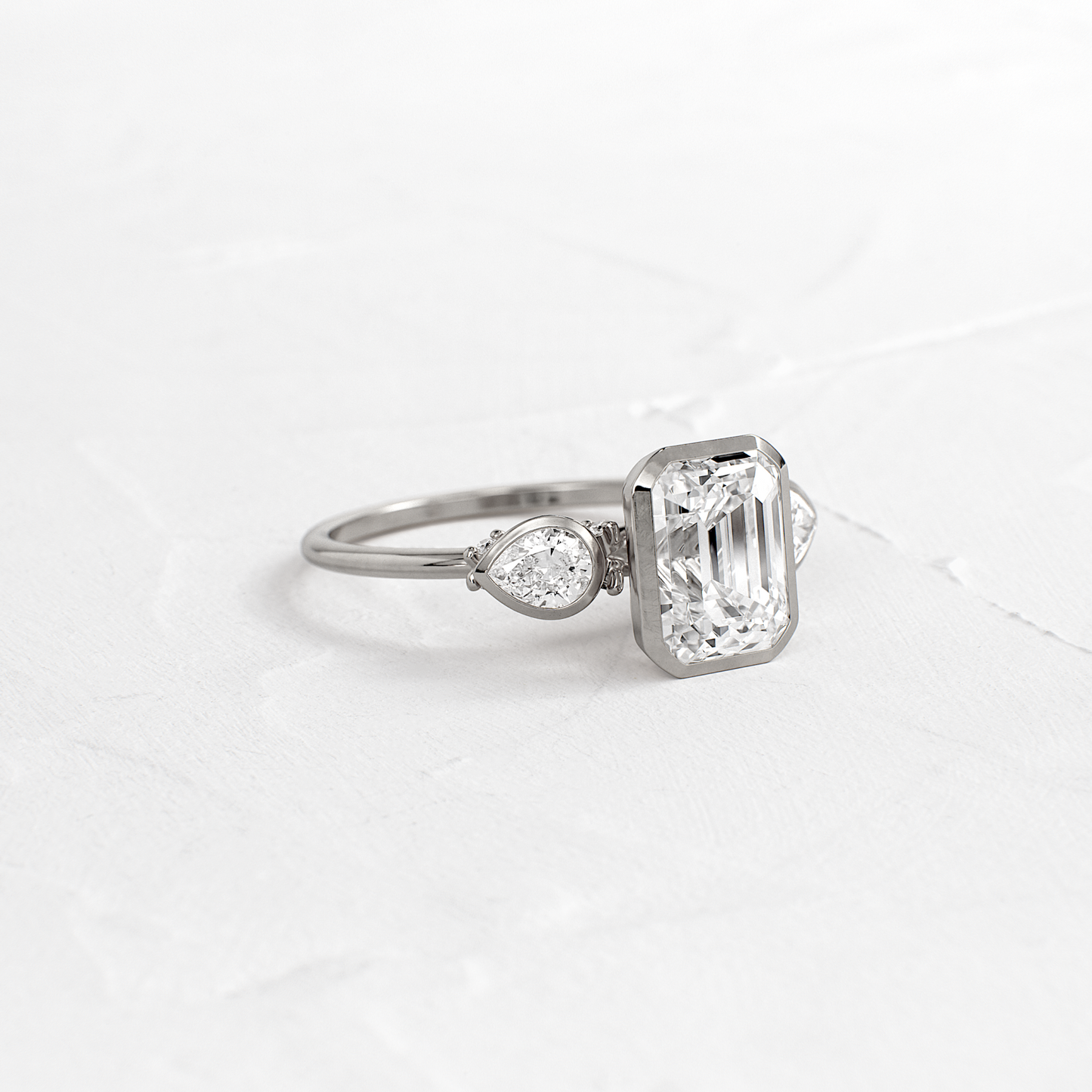 Bezel Three Stone-Emerald Lab Grown Diamond Engagement Ring