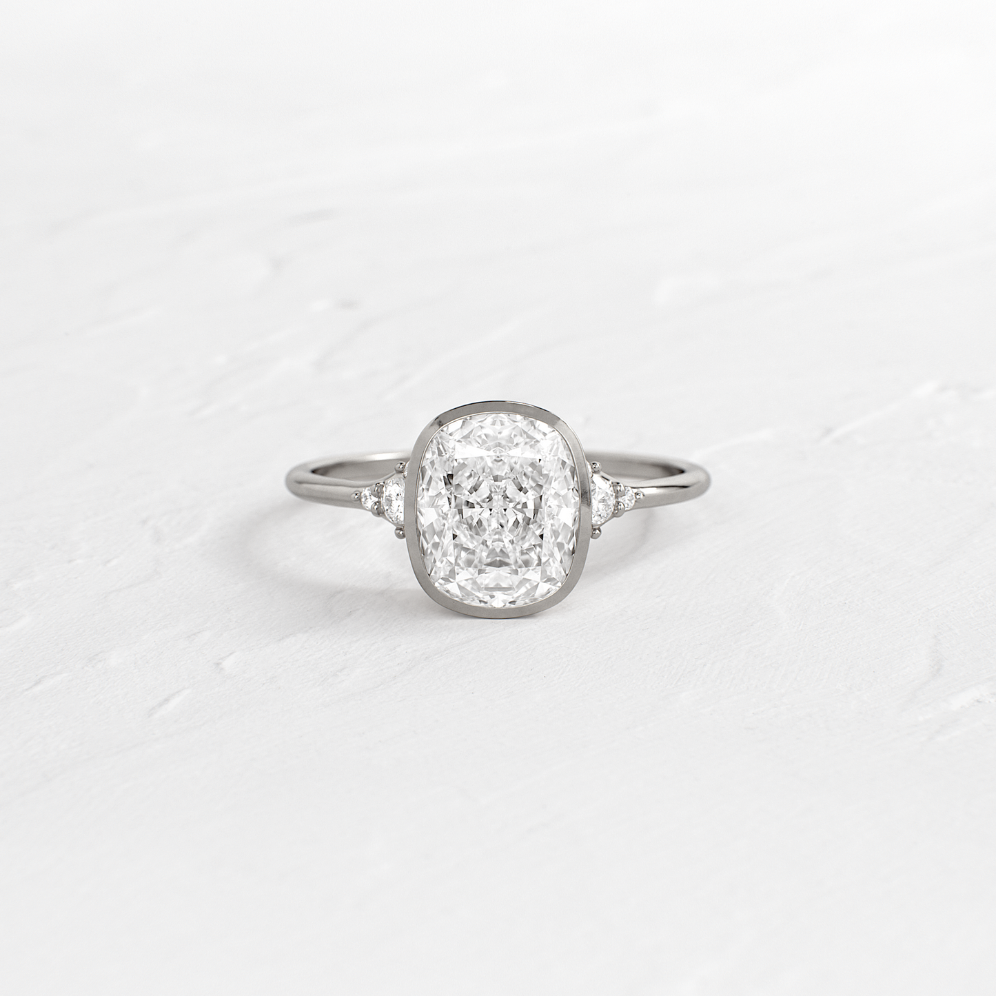 Bezel & Cluster Style-Elongated Cushion Lab Grown Diamond Engagement Ring