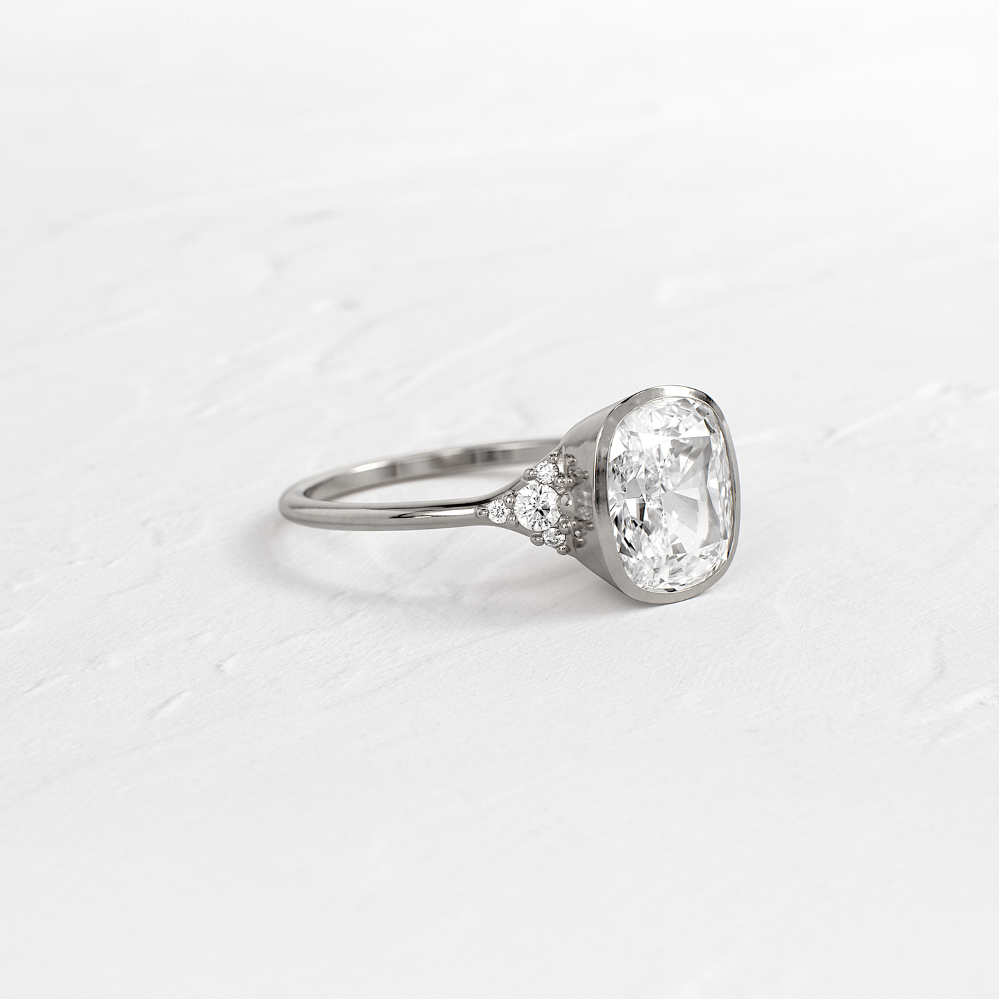 Bezel & Cluster Style-Elongated Cushion Lab Grown Diamond Engagement Ring
