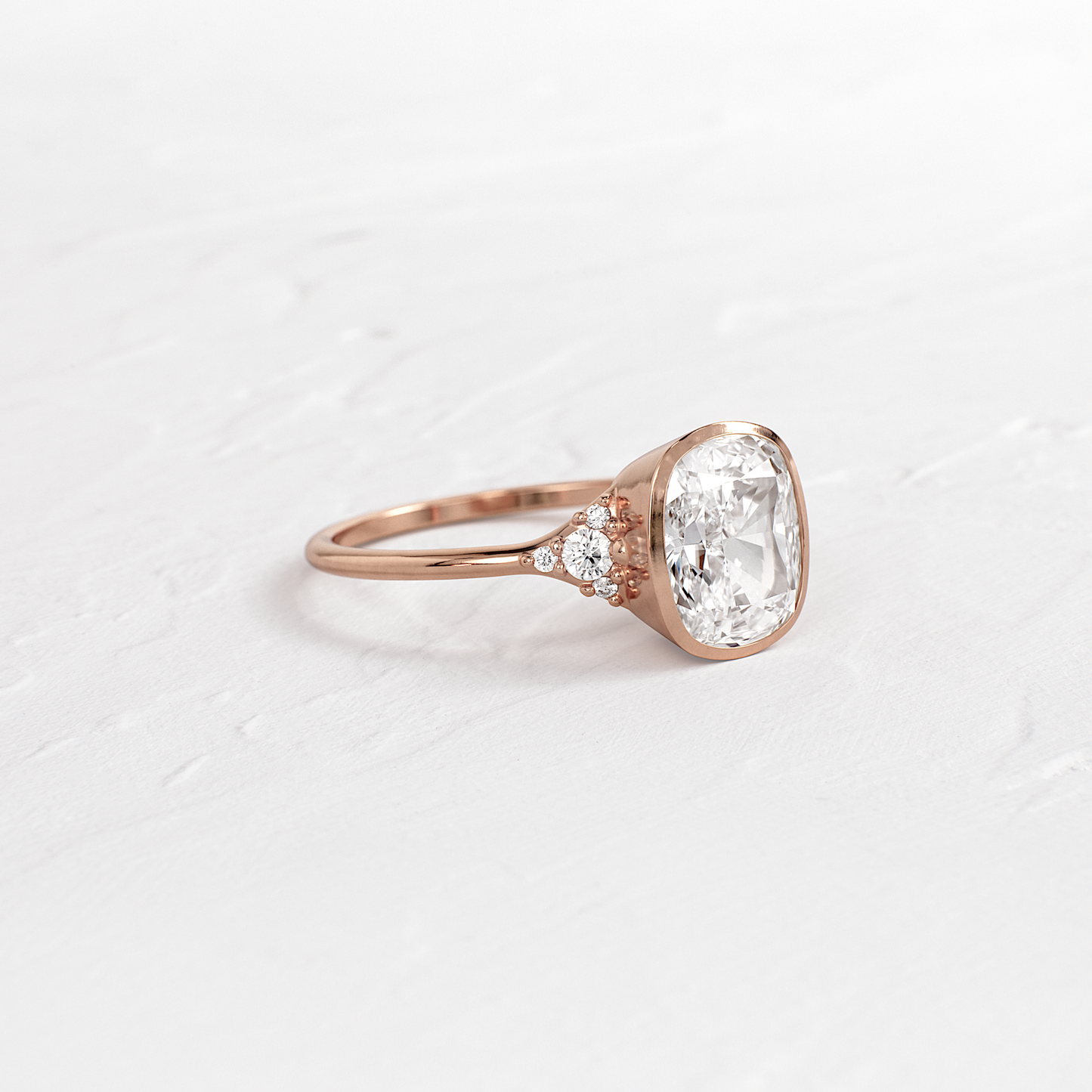 Bezel & Cluster Style-Elongated Cushion Lab Grown Diamond Engagement Ring