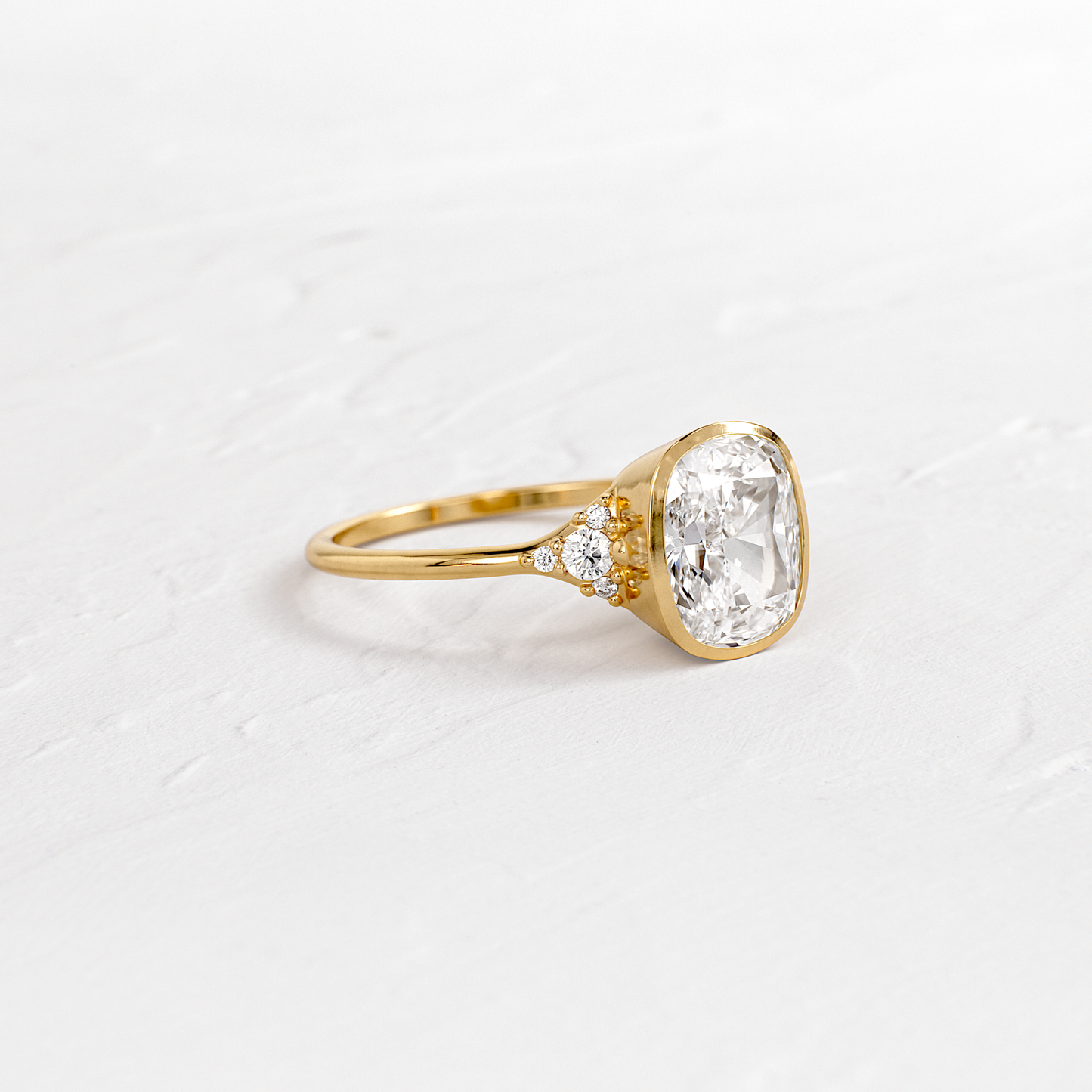 Bezel & Cluster Style-Elongated Cushion Lab Grown Diamond Engagement Ring