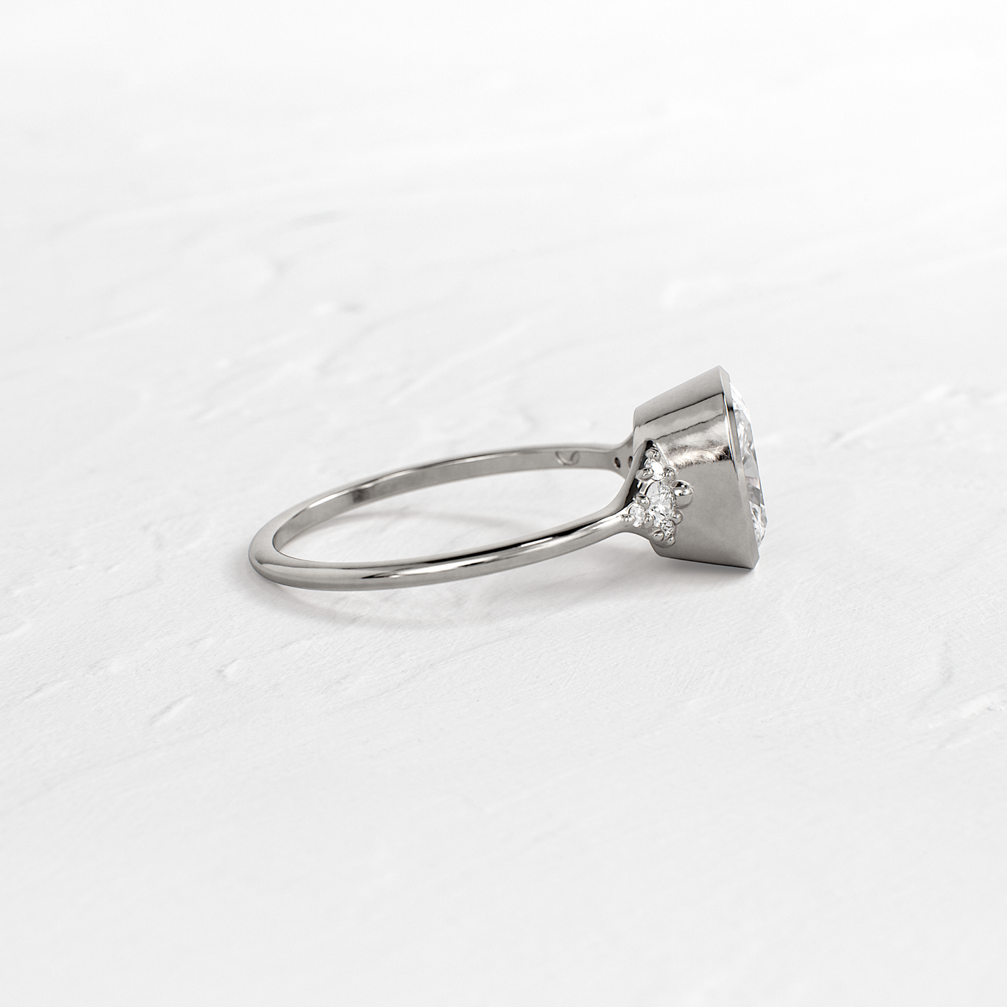 Bezel & Cluster Style-Elongated Cushion Lab Grown Diamond Engagement Ring