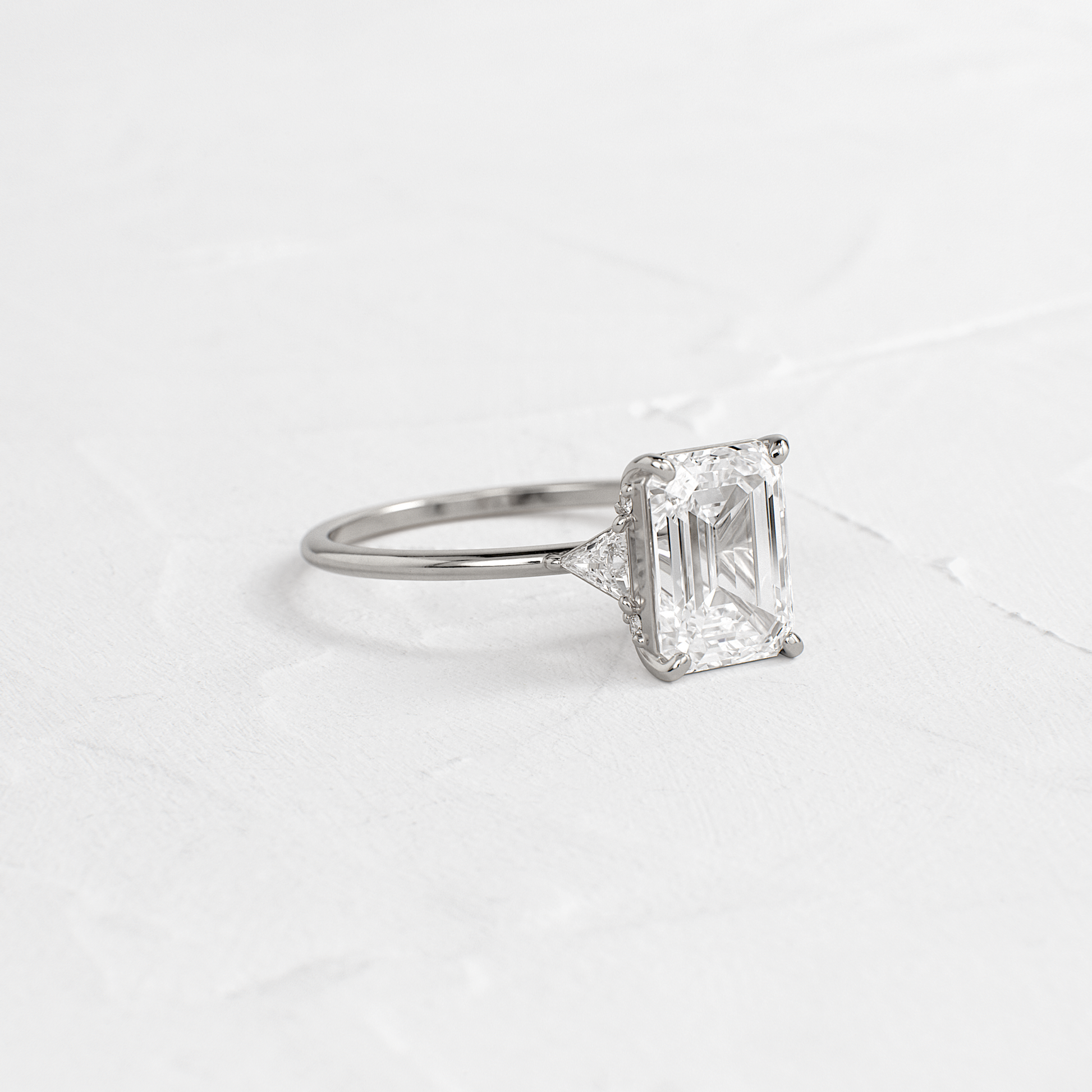 Three Stone with Hidden Stones-Emerald Lab Grown Diamond Engagement Ring