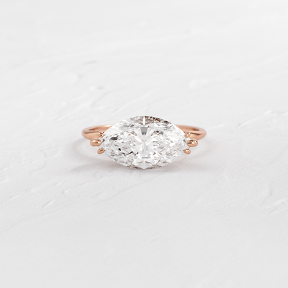 East West Solitaire with Hidden Stones-Marquise Lab Grown Diamond Engagement Ring