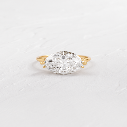 East West Solitaire with Hidden Stones-Marquise Lab Grown Diamond Engagement Ring