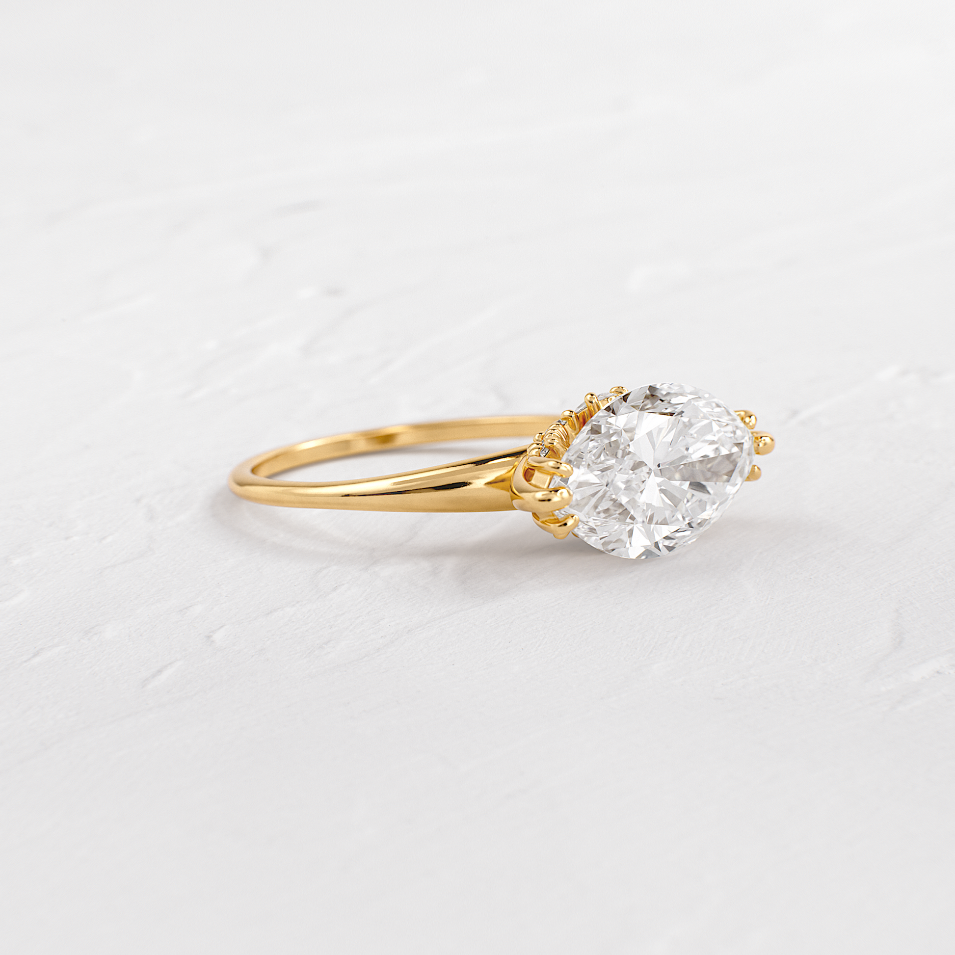 East West Solitaire with Hidden Stones-Marquise Lab Grown Diamond Engagement Ring