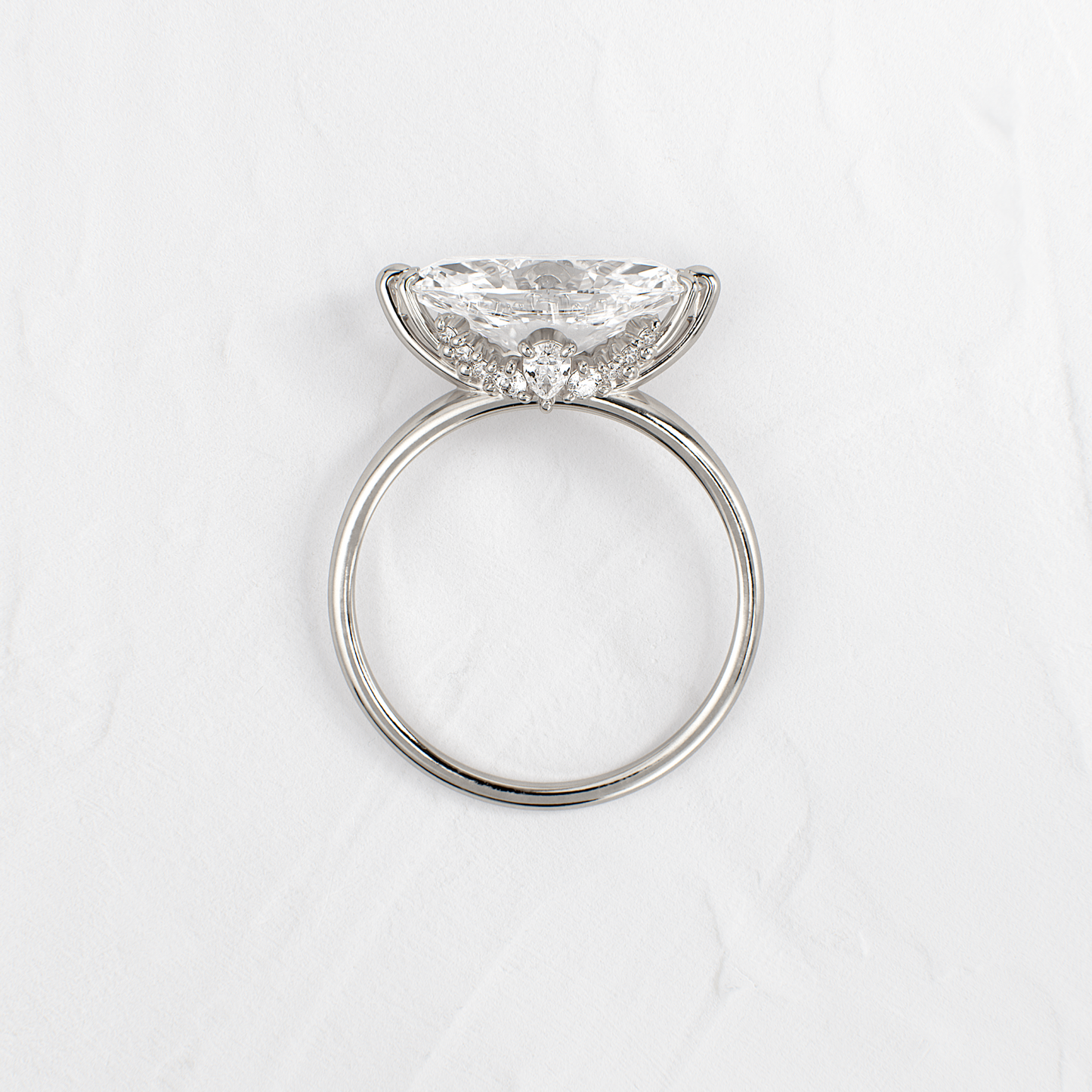 East West Solitaire with Hidden Stones-Marquise Lab Grown Diamond Engagement Ring