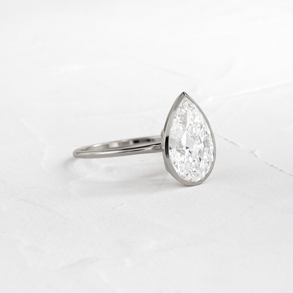 Solitaire Bezel with Hidden Stones-Pear Lab Grown Diamond Engagement Ring