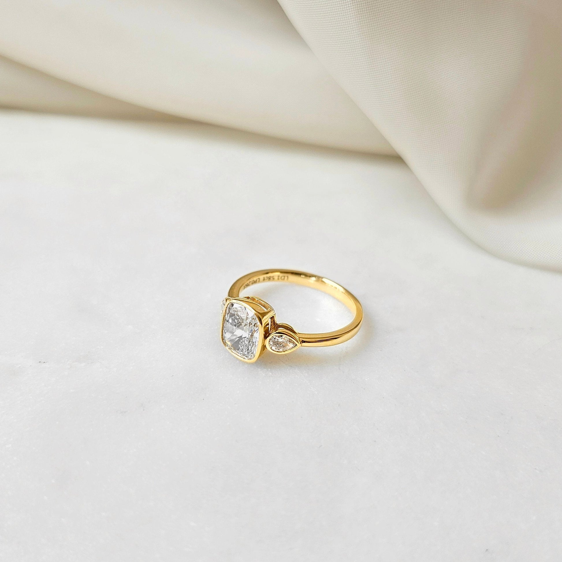 Three Stone & Bezel-1.6 CT Elongated Cushion Lab Grown Diamond Engagement Ring