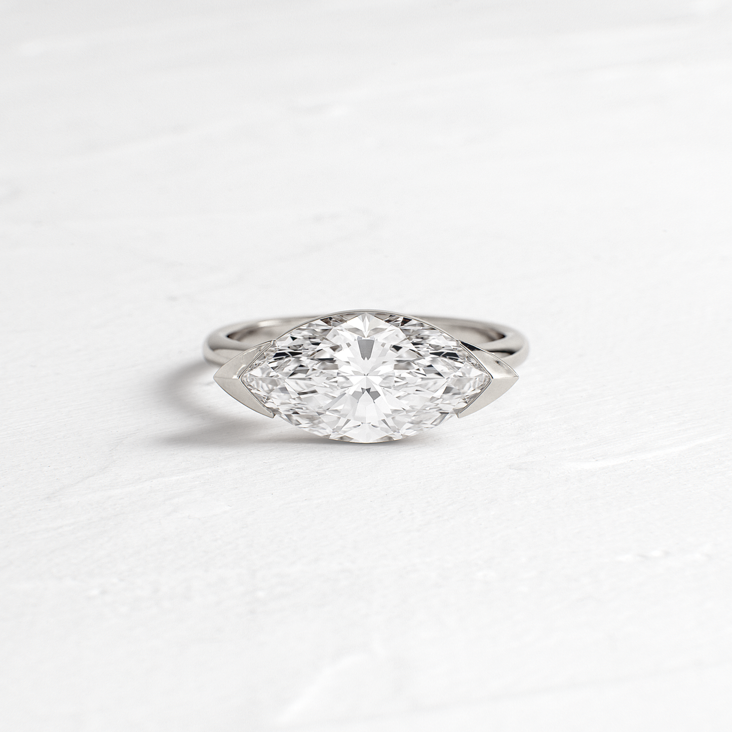 East West Solitaire Half Bezel-Marquise Lab Grown Diamond Engagement Ring